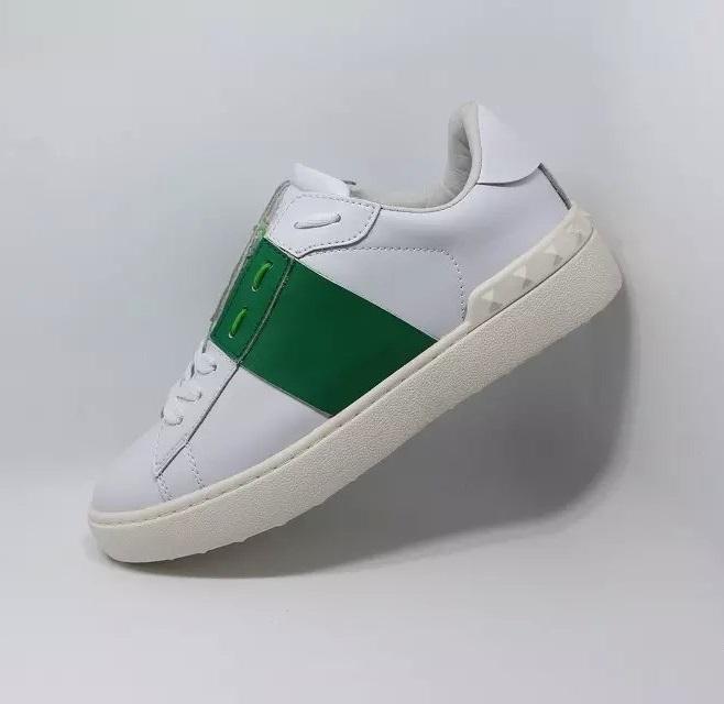 Кроссовки белые с зеленой вставкой